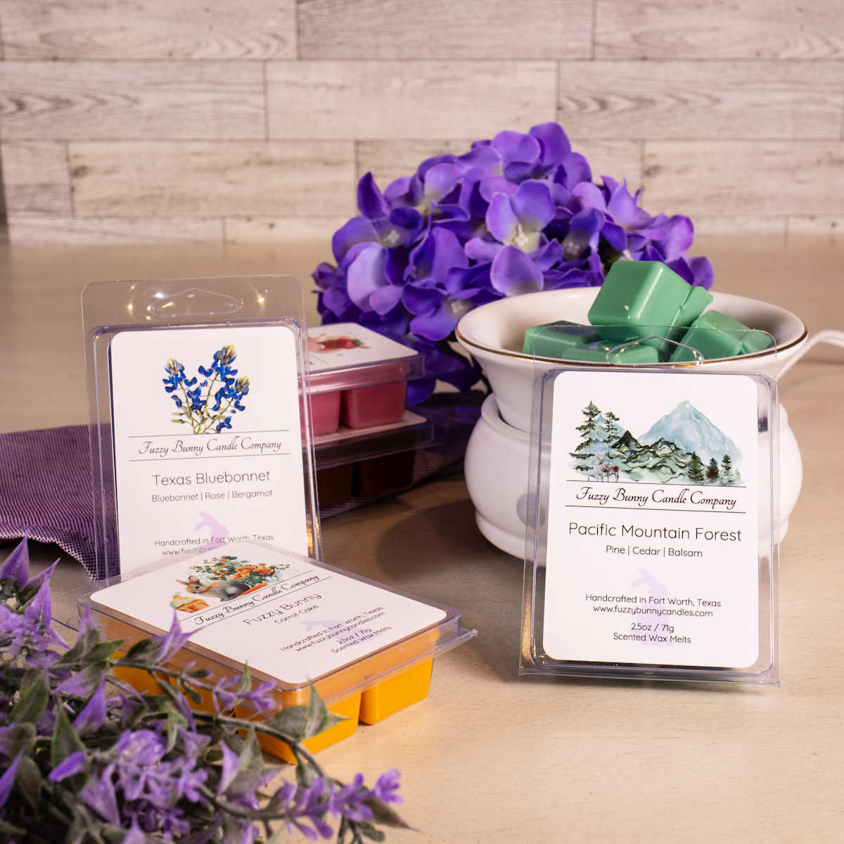 Assortment of Classic Collection Scented Wax Melts including Texas Bluebonnet, Strawberries and Cream, Magnolia, and Pacific Mountain Forest.